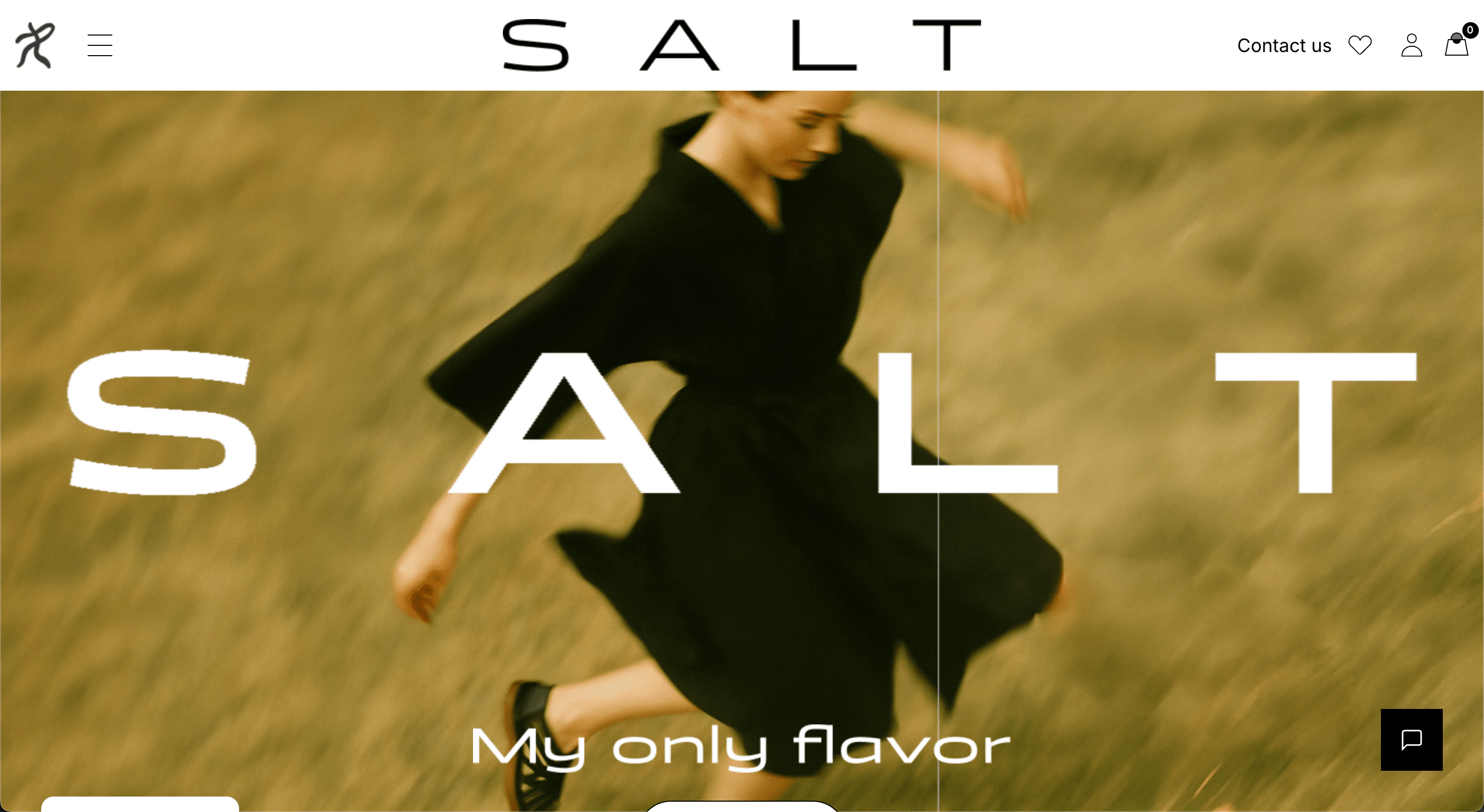 A fashion storefront with the brand name set across full-bleed footage of a model walking through a field.